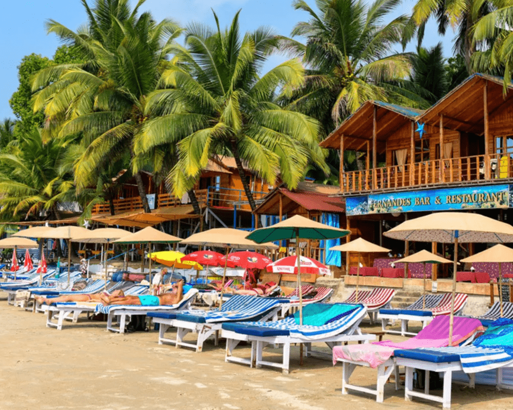 Beach shacks and sun loungers on Baga Beach, Goa