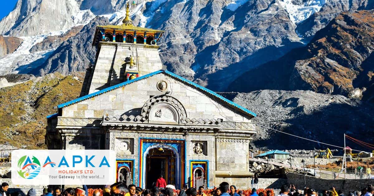 Kedarnath temple with snow peaks and pilgrims, Char Dham Yatra guide