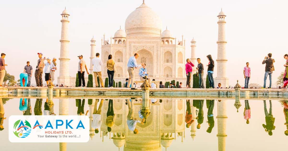 Visitors at the Taj Mahal with reflection, customised and group tours